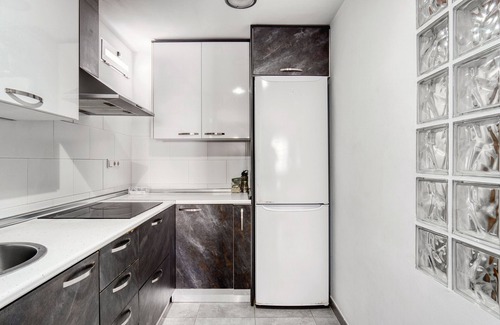 Monte Faro Apartamento | Apartamento 'Adosado En Gran Alacant Santa Pola' con piscina compartida, Wi-Fi y aire acondicionado.