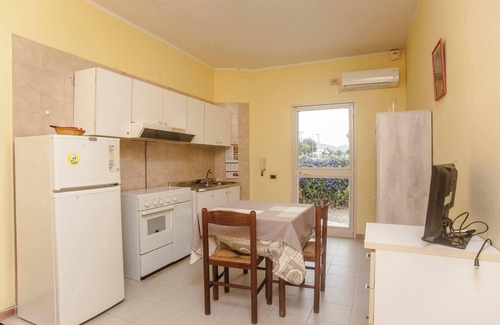 Villa San Pietro Apartamento | "Apartamento Alice" con vistas a la montaña, Wi-Fi, aire acondicionado, terraza y jardín