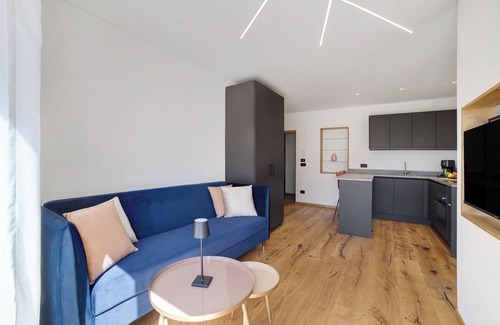 Rifiano Apartamento | Apartamento "Alivo Living Apartment Aurora" con vistas a la montaña y jardín