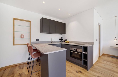 Rifiano Apartamento | Apartamento "Alivo Living Apartment Aurora" con vistas a la montaña y jardín