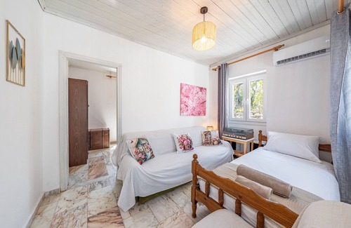 Antipaxos Apartamento | Apartamento 'Ambelaki' con vistas al mar, jardín privado y Wi-Fi