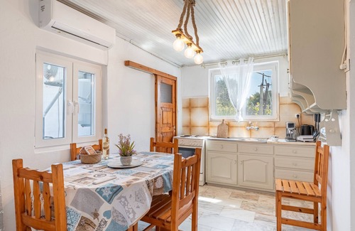 Antipaxos Apartamento | Apartamento 'Ambelaki' con vistas al mar, jardín privado y Wi-Fi