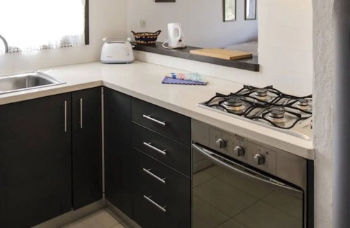Son Xoriguer Apartamento | Apartamento 'Apartamento 1 Dormitorio II' con terraza privada y jardín compartido