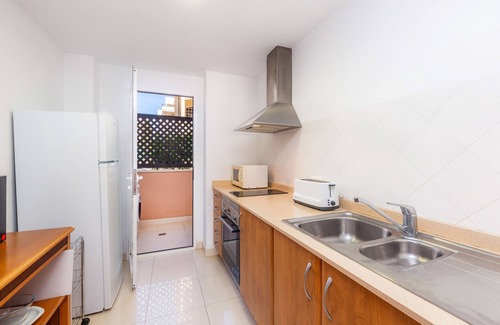 Cala Bona Apartamento | Apartamento 'Apartamento Espiga' con piscina compartida, Wi-Fi y aire acondicionado