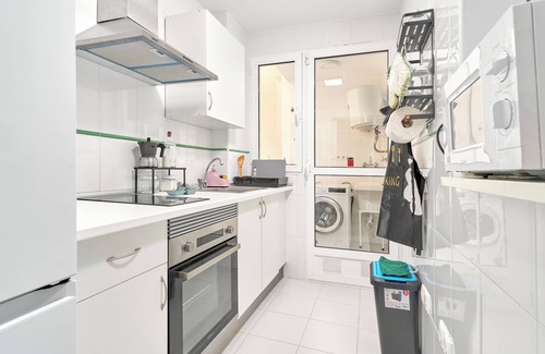Polopos Apartamento | Apartamento 'Apartamento Costa Sol' con piscina compartida, terraza privada y aire acondicionado.