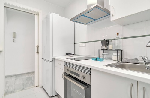 Polopos Apartamento | Apartamento 'Apartamento Costa Sol' con piscina compartida, terraza privada y aire acondicionado.