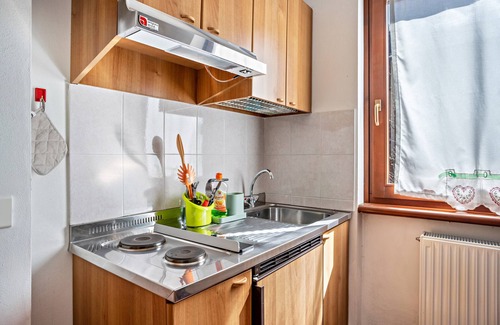 Strembo Apartamento | Apartamento "Aparthotel Strembo Casinei" con vistas a la montaña y jardín compartido