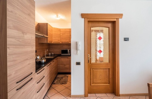 Rocca Pietore Apartamento | Apartamento 'Appartamento Bilocale 2' con vistas a la montaña, jardín compartido y Wi-Fi