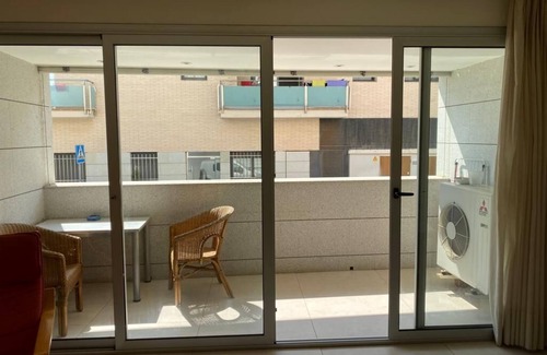 Les Cases d'Alcanar Apartamento | Apartamento 'Belmar' con terraza privada y aire acondicionado