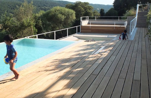 Aglientu Apartamento | Apartamento 'Barone Rampante' con piscina compartida, jardín privado y aire acondicionado