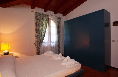 Puntaldia Apartamento | Apartamento 'Bilo Oleandro' con piscina compartida, terraza privada y aire acondicionado
