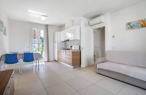 Faro Apartamento | Apartamento 'Blu Village' con piscina compartida, terraza privada y aire acondicionado