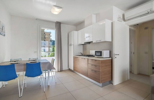 Faro Apartamento | Apartamento 'Blu Village' con piscina compartida, terraza privada y aire acondicionado