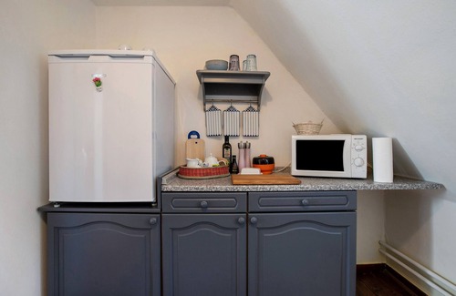 Wesselburen Apartamento | Apartamento 'Blaue Wolke' con jardín comunitario y Wi-Fi