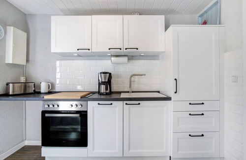 Schaprode Apartamento | Apartamento 'Boddenferienhaus - 13 Treibholz' con terraza compartida y Wi-Fi