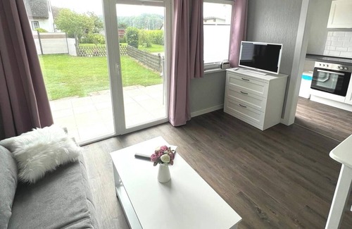 Schaprode Apartamento | Apartamento 'Boddenferienhaus - 12 Molenfeuer' con terraza compartida, jardín compartido y Wi-Fi