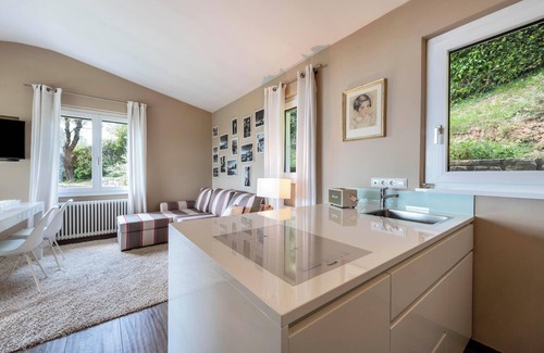 Gargnano Apartamento | Apartamento "Casa 50" con jardín y piscina compartida