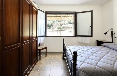 Elini Casa | Apartamento "Casa Corongiu 5" con vistas a la montaña y jardín compartido
