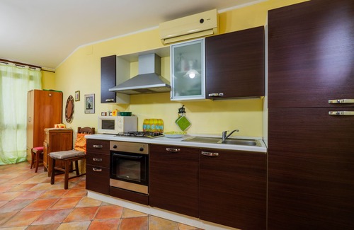 Galatone Apartamento | Apartamento 'Casa dei Delfini' con jardín y aire acondicionado