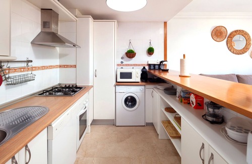Caleta de Velez Apartamento | Apartamento "Casa Baviera Golf" con vistas a la montaña, piscina compartida y Wi-Fi