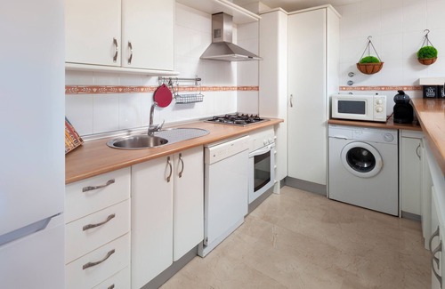 Caleta de Velez Apartamento | Apartamento "Casa Baviera Golf" con vistas a la montaña, piscina compartida y Wi-Fi