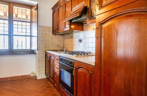 La Pesta Apartamento | Apartamento Casa Vacanza Il Carpignone 6 con vistas al lago, piscina compartida y jardín