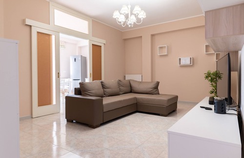 Pulsano Apartamento | Apartamento 'Casa Vacanze Francesco' con balcón, Wi-Fi y aire acondicionado