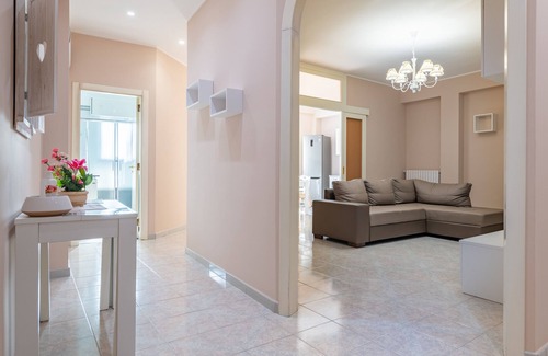 Pulsano Apartamento | Apartamento 'Casa Vacanze Francesco' con balcón, Wi-Fi y aire acondicionado