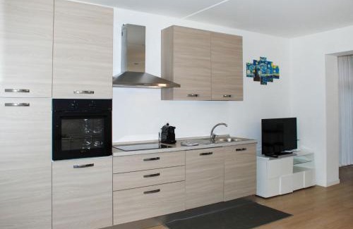 Bissone Apartamento | Apartment Charming Gardenview App- 105 by Interhome