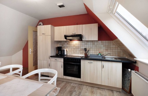 Hedwigenkoog Apartamento | Apartamento 'Deichblick 1' con jardín y balcón compartidos