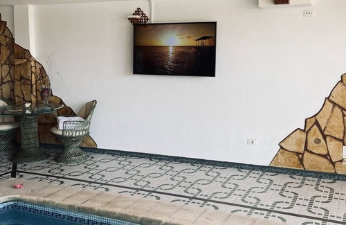 Arucas Apartamento | Apartamento Delfin Azul con piscina privada y climatizada(Bajo techo de madera)