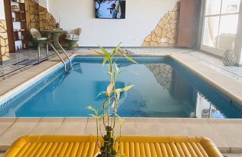 Arucas Apartamento | Apartamento Delfin Azul con piscina privada y climatizada(Bajo techo de madera)