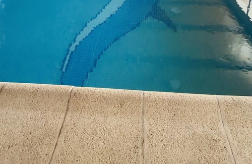 Arucas Apartamento | Apartamento Delfin Azul con piscina privada y climatizada(Bajo techo de madera)