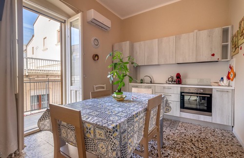 Mottola Apartamento | Apartamento 'Dormiamoci Sù' con balcón, Wi-Fi y aire acondicionado