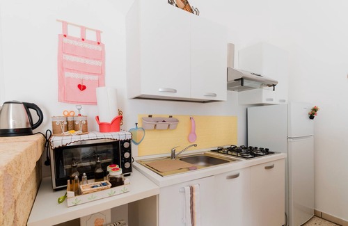 Marina di Mancaversa Apartamento | Apartamento 'E Case Tu Bertu - Gallipoli' con piscina privada, terraza privada y aire acondicionado