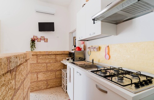 Marina di Mancaversa Apartamento | Apartamento 'E Case Tu Bertu - Gallipoli' con piscina privada, terraza privada y aire acondicionado