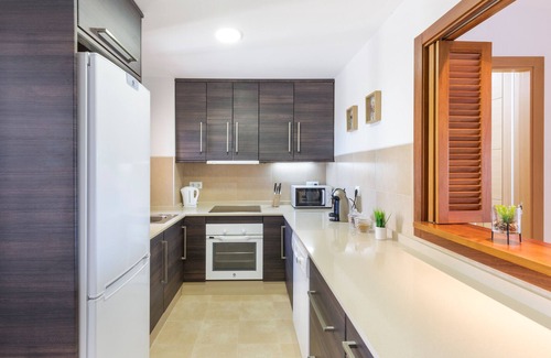 Fuente Álamo de Murcia Apartamento | Apartamento 'El Oasis Martinica 4 2 A' con vistas a la montaña, Wi-Fi y aire acondicionado.