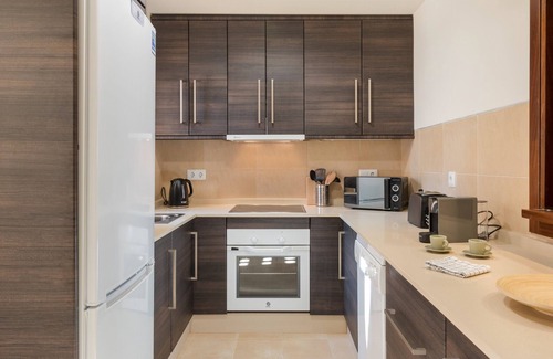 Fuente Álamo de Murcia Apartamento | Apartamento 'El Oasis Malta 1 Bajo A' con piscina compartida, Wi-Fi y aire acondicionado.