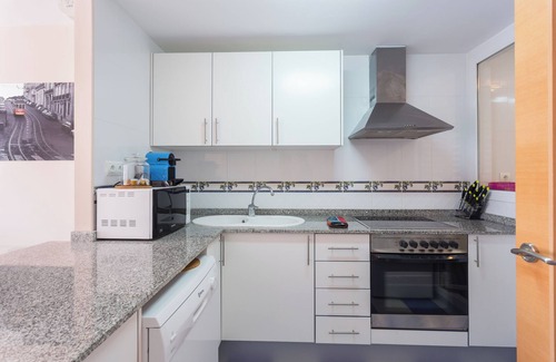 Les Deveses Apartamento | Apartamento 'Entre Olas 2' con piscina compartida, terraza privada y aire acondicionado.