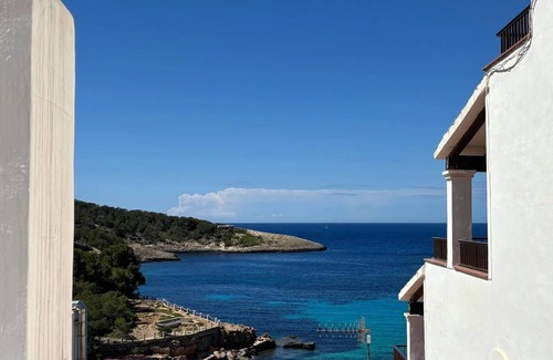 Portinatx Apartamento | Apartamento 'Vista Jardi5C' con vistas al mar, Wi-Fi y aire acondicionado