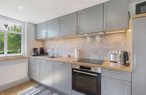 Ortsmitte Apartamento | Apartamento 'Feldmann Auf Der Mauer' con jardín compartido y Wi-Fi