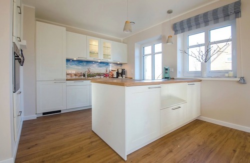 Pellworm Apartamento | Apartamento 'Ferienhaushälfte Hafenperle' con jardín compartido y Wi-Fi