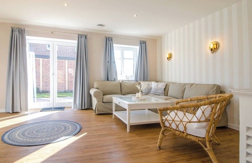 Pellworm Apartamento | Apartamento 'Ferienhaushälfte Hafenperle' con jardín compartido y Wi-Fi