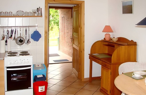 Marienkoog Apartamento | Apartamento 'Ferienwohnung Achterndiek' con terraza privada, jardín privado y Wi-Fi