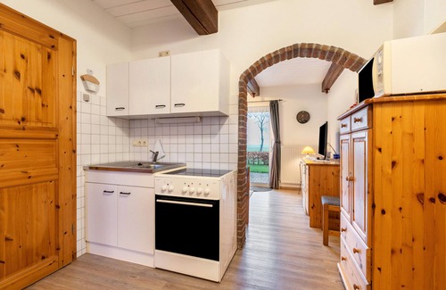 Bordelum Apartamento | Apartamento 'Ferienwohnung 1 Hühner' con jardín compartido y Wi-Fi
