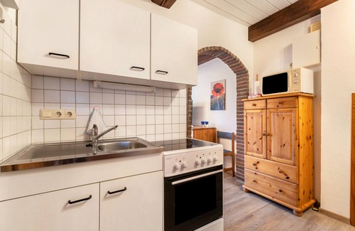 Bordelum Apartamento | Apartamento 'Ferienwohnung 1 Hühner' con jardín compartido y Wi-Fi