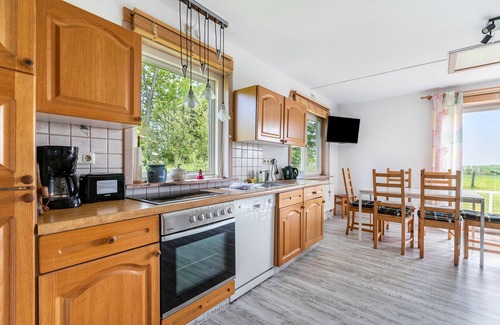 Saustrup Apartamento | Apartamento 'Ferienwohnung Erika' con terraza privada, jardín privado y Wi-Fi