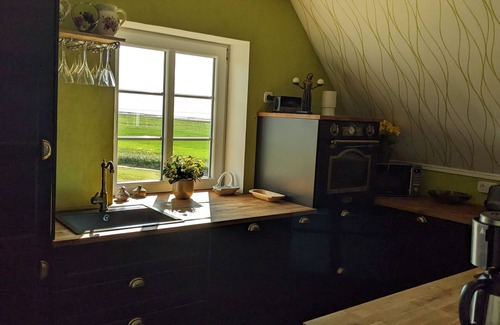 Langeneß Apartamento | Apartamento 'Ferienwohnung Hafenblick' con vistas al mar, terraza compartida y Wi-Fi