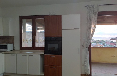 Lu Bagnu Apartamento | Ático con gran porche y una increíble vista del Golfo.