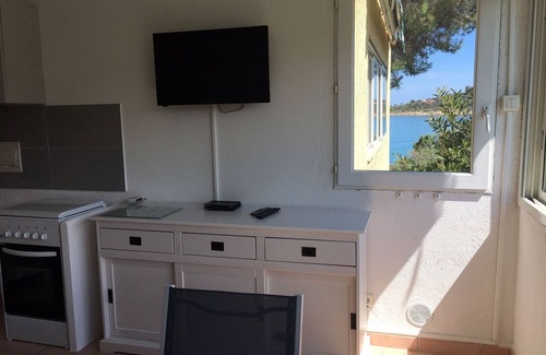 Favone Apartamento | Faounzina, 4 pers, 1 ° piso, frente al mar con acceso directo a la playa